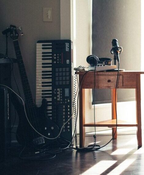 several guitars beside of side table